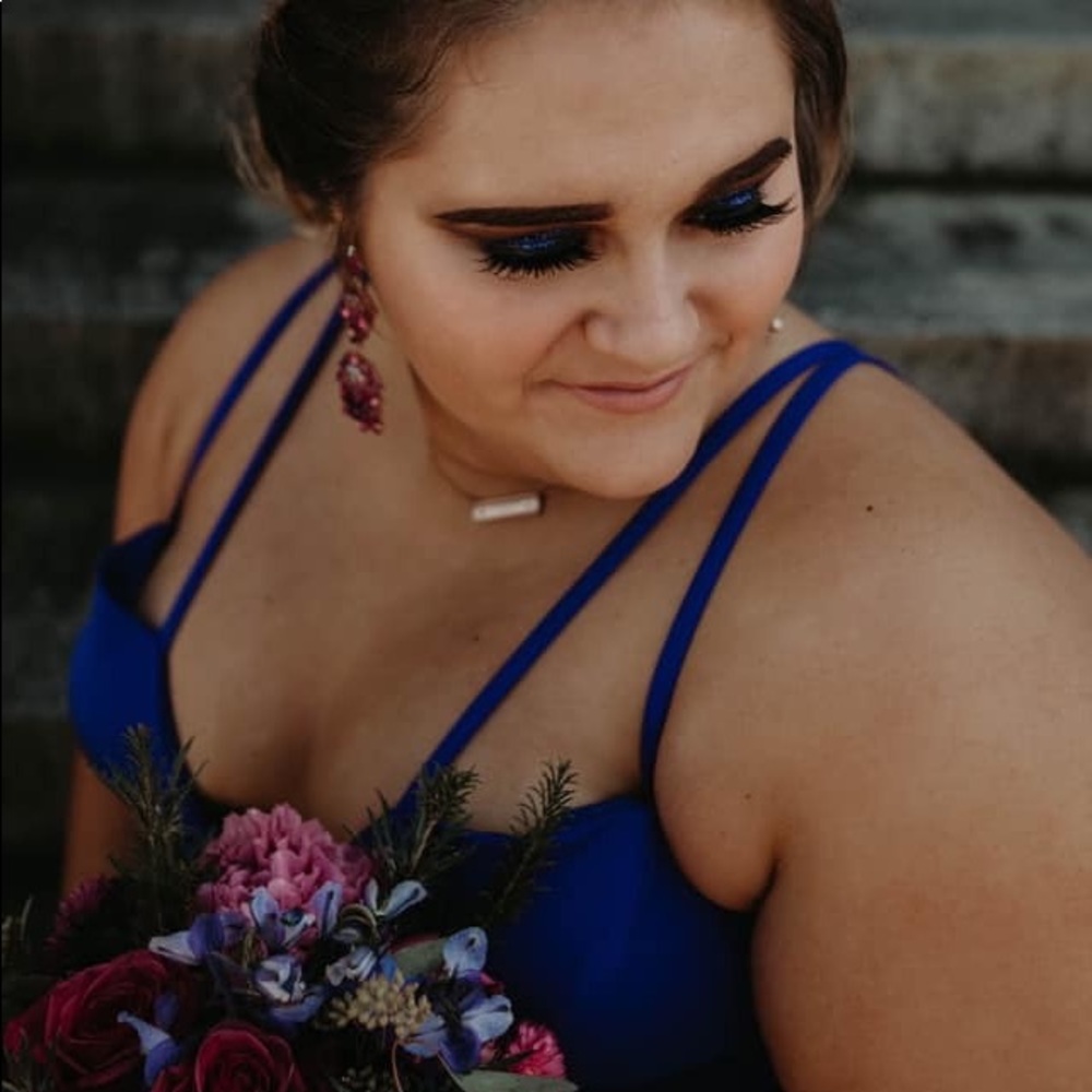 Size 18 prom dress taken in as 14 can be loosened